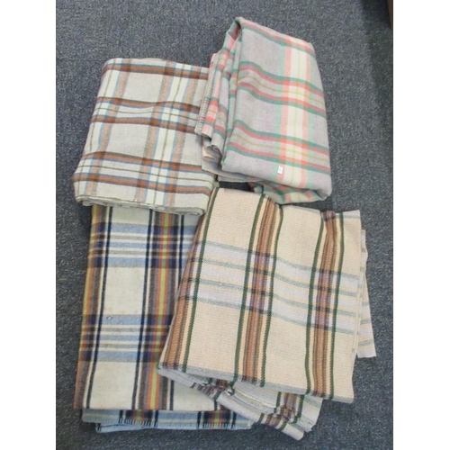 109 - Four vintage check design blankets or carthen in various colours. (4)
(B.P. 21% + VAT)