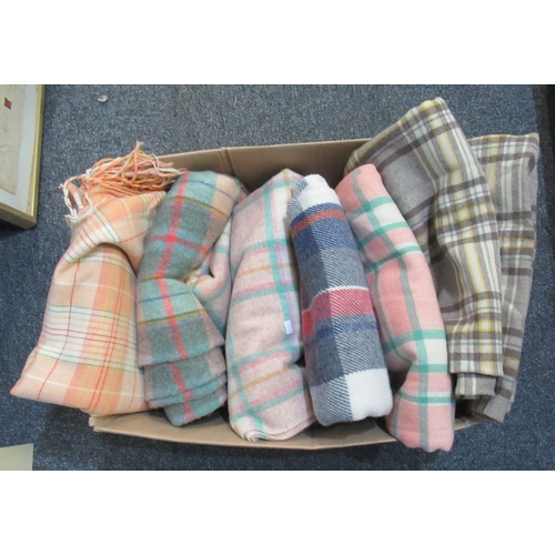 111 - Collection of woollen blankets/carthen and throws, all check, in various colours. (6)
(B.P. 21% + VA... 