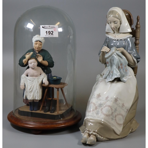 192 - Lladro Spanish porcelain figurine of a seated young lady sewing, together with an unusual painted wo... 