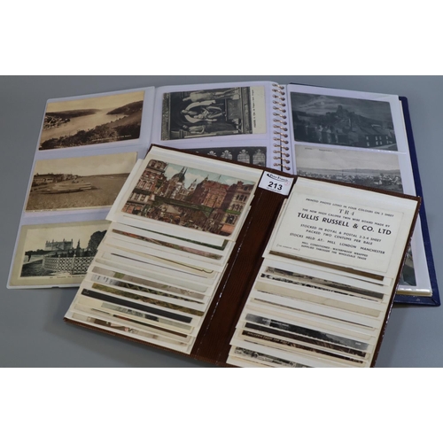 213 - Two albums of postcards to include topographical, architectural, greetings, harbour scenes, etc. (2)... 