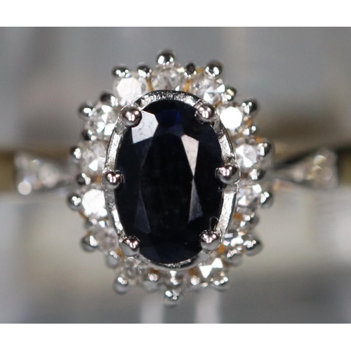 257 - 9ct gold sapphire and diamond cluster ring.  Ring size P.  Approx weight 3 grams.  
(B.P. 21% + VAT)