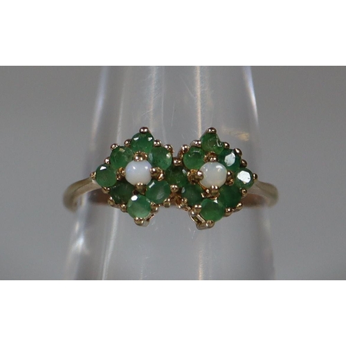 265 - 9ct gold dress ring, set with opals and green stones. 2.3g approx.
(B.P. 21% + VAT)