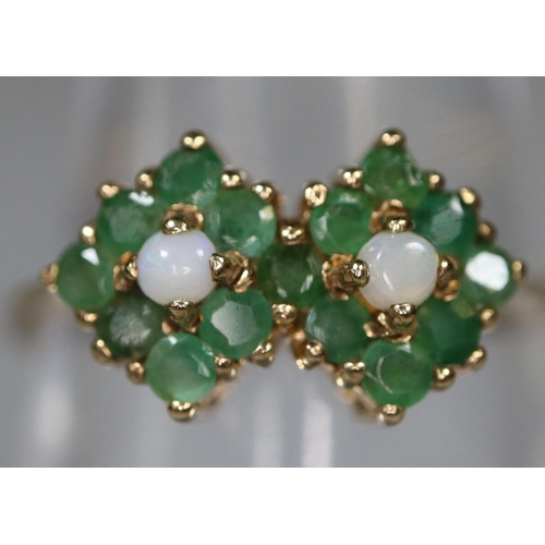 265 - 9ct gold dress ring, set with opals and green stones. 2.3g approx.
(B.P. 21% + VAT)