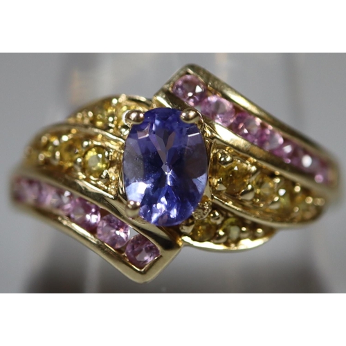 267 - Modern 9ct gold twist shank, stone set dress ring with amethyst-type central stone and pink small st... 