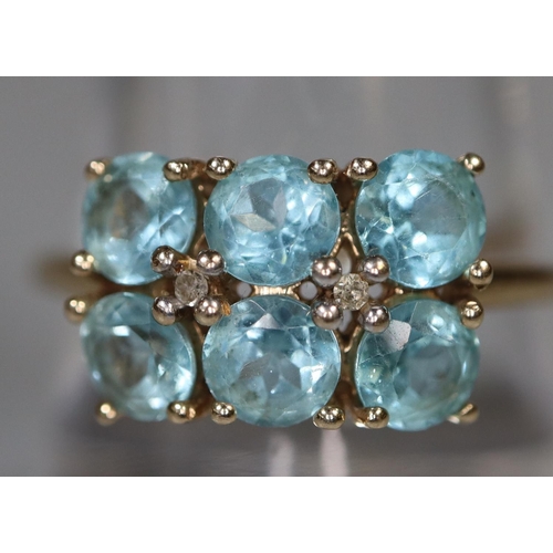 278 - 9ct gold double row probably aquamarine dress ring. 2.4g approx.
(B.P. 21% + VAT)