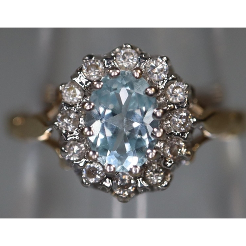 279 - 9ct gold step set aquamarine and diamond chip dress ring. 3g approx.
(B.P. 21% + VAT)