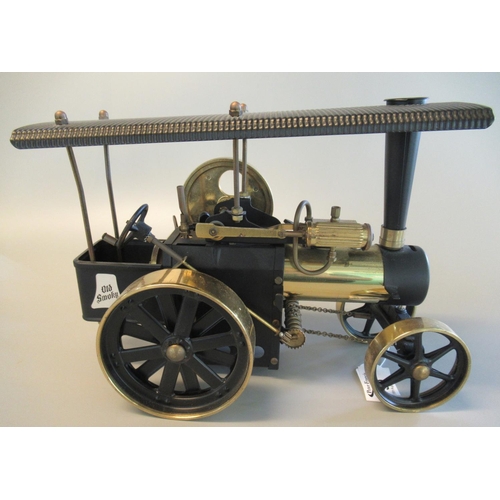 30 - Decorative brass model of a steam traction engine.
(B.P. 21% + VAT)