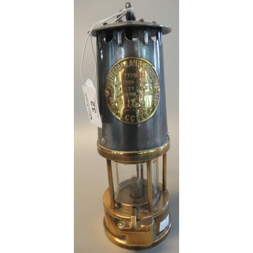 32 - Protector Lamp & Lighting Co Ltd original used brass miner's safety lamp.
(B.P. 21% + VAT)
