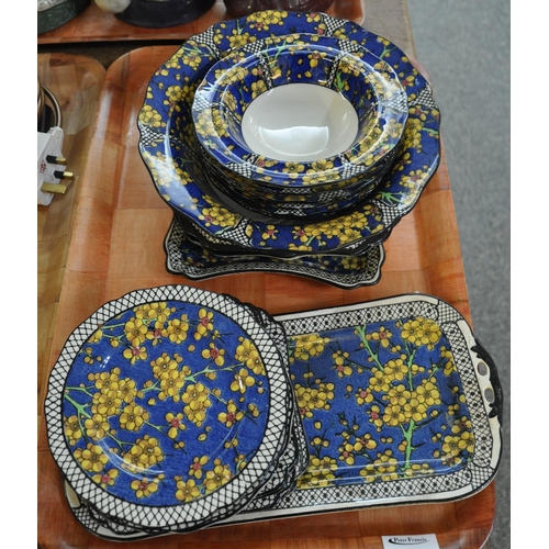 335 - Tray of Royal Doulton 'Prunus' pattern part dinnerware. Stylised yellow flowers on a blue ground wit... 