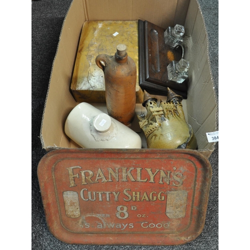 384 - Box containing assorted items to include: a 'Franklin's Cutty Shagg  8/D per oz. is always good' vin... 