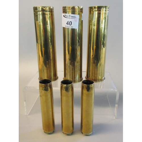 40 - A group of six brass shell case vases, of two sizes, 16cm and 11cm high approx. (6)
(B.P. 21% + VAT)