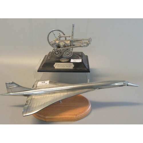 61 - Diecast white metal study of the airliner Concorde on moulded wooden base,  together with  model of ... 