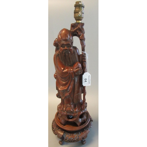 64 - Chinese carved root wood figure of an immortal now as a table lamp, together with turned carved and ... 