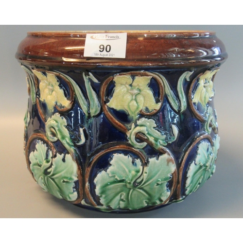 90 - Staffordshire majolica baluster shaped jardiniere relief decorated with trailing foliage. Unmarked.
... 