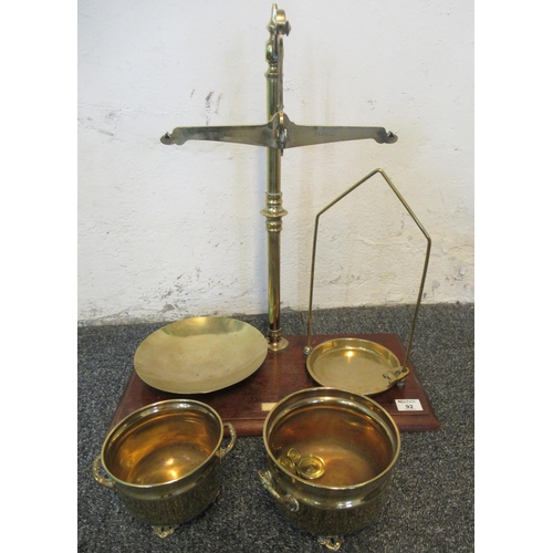 92 - Large pair of brass pillar scales having trays and together with two small brass jardinieres. 
(B.P.... 