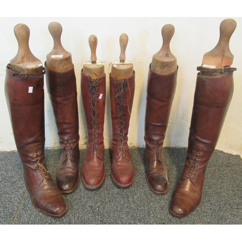 93 - Three pairs of military style possibly First World War period leather knee length boots, all with be... 