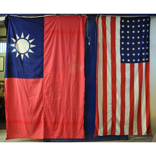 481 - A large collection of national flags and bunting, originally displayed on a Carmarthen home at the t... 