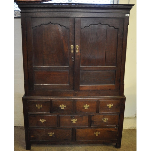 484 - 19th Century Welsh oak two stage linen press cupboard, the moulded and dental cornice above two blin... 