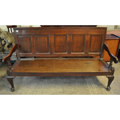 493 - 18th Century English oak panel backed settle, the moulded top above five mahogany cross banded panel... 