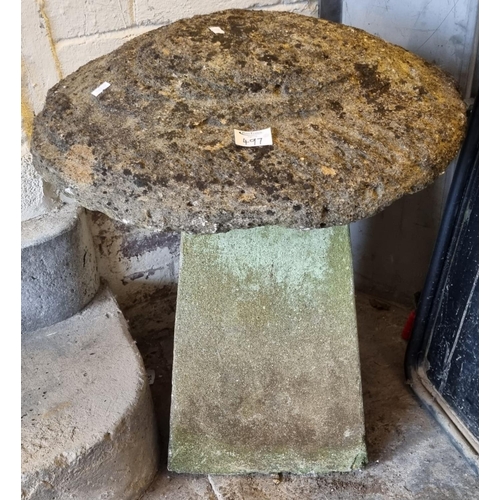 497 - A pair of mushroom shaped staddle stones, the bases later cement or concrete. 60cm high approx. (2)
... 