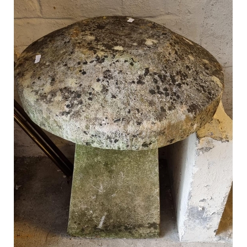 497 - A pair of mushroom shaped staddle stones, the bases later cement or concrete. 60cm high approx. (2)
... 