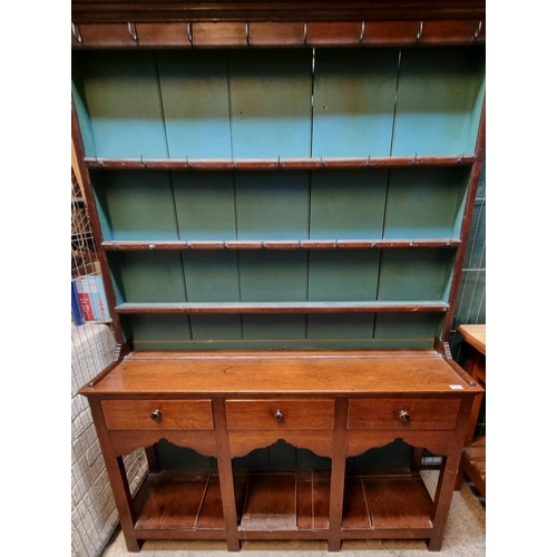 501 - 19th Century oak two stage rack back pot board dresser of small proportions, the moulded top above i... 