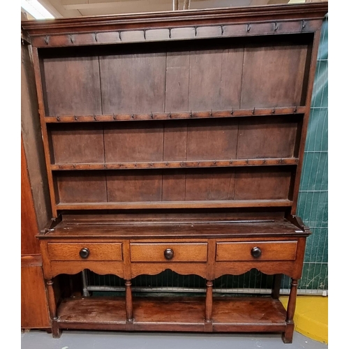 504 - 19th Century oak two stage pot board dresser, the moulded top above panelled back and iron hooks wit... 