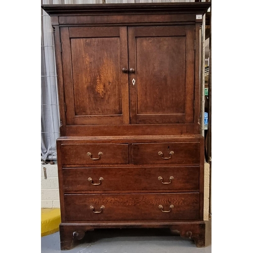 505 - 19th Century Welsh oak two stage press cupboard, the moulded cornice above two blind panelled doors,... 