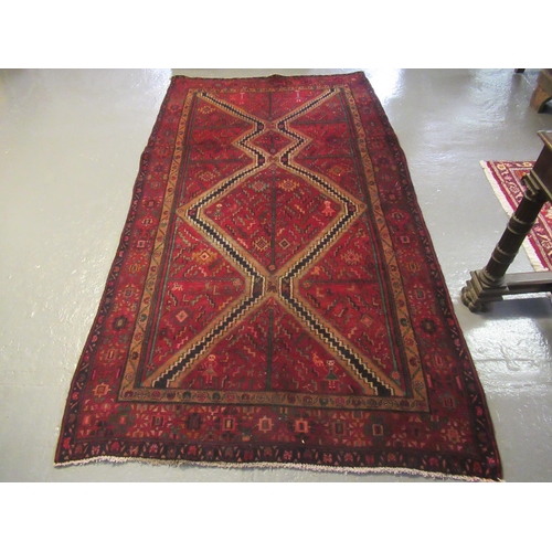 516 - Red ground geometric Persian Nahavan village rug. 149 x 283cm approx. 
(B.P. 21% + VAT)