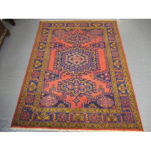 524 - Burgundy ground old Persian geometric and foliate Bakhytar village rug. 220 x 160cm approx. 
(B.P. 2... 