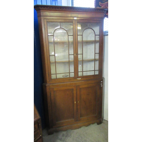 661 - 19th Century Welsh oak two stage two door glazed corner cabinet. 
(B.P. 21% + VAT)