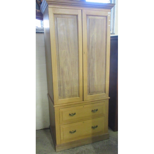 662 - Early 20th Century pine two door blind panelled linen press type cupboard, the fielded blind panelle... 