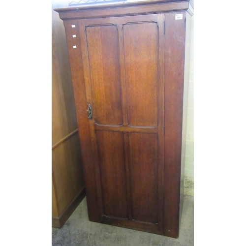 663 - Early 20th Century oak single door blind panelled hall cupboard. 
(B.P. 21% + VAT)