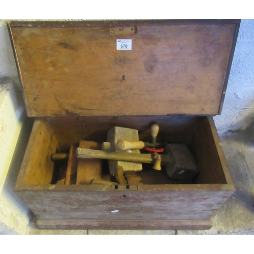 670 - Small pine carpenter's box, the interior revealing assorted vintage tools to include; mallets, plane... 