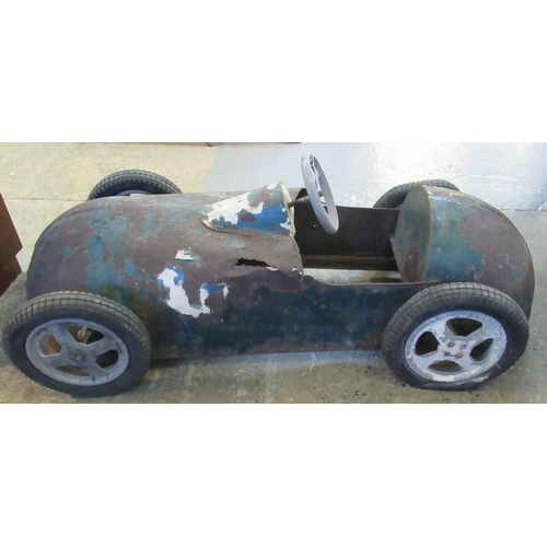 679 - Mid Century child's metal pedal car in the form of a front engine single seater racing car believed ... 