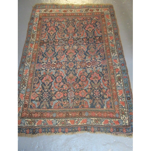 687 - Middle Eastern design blue ground rug having multi-coloured flowers and foliage. 115 x 160cm approx.... 