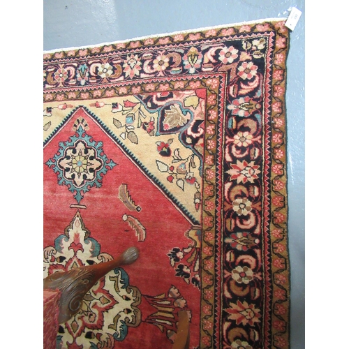 690 - Middle Eastern design Lilian rug on a multi-coloured ground, the central medallion on a pink ground ... 