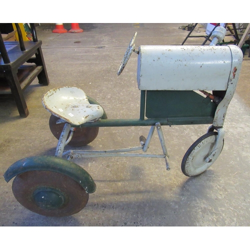 694 - Mid Century child's pedal three wheel tractor.
(B.P. 21% + VAT)