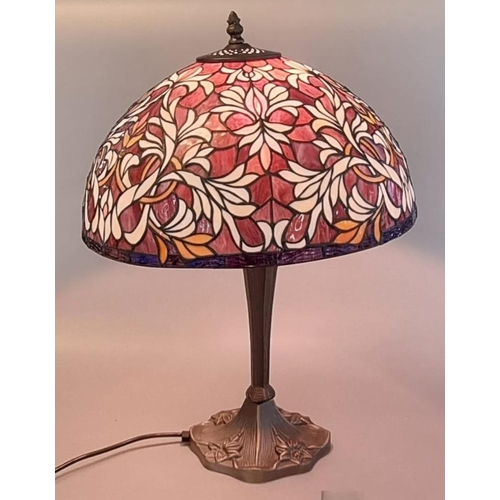 83 - Large modern Tiffany style table lamp, the bronzed base with foliate leaded type shade. 57cm high ap... 