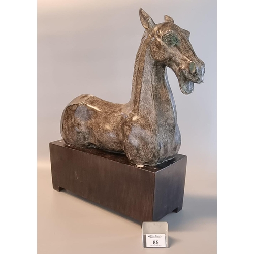 85 - Modern sculptural study of a horse on ebonised base. 46cm high approx.
(B.P. 21 + VAT)