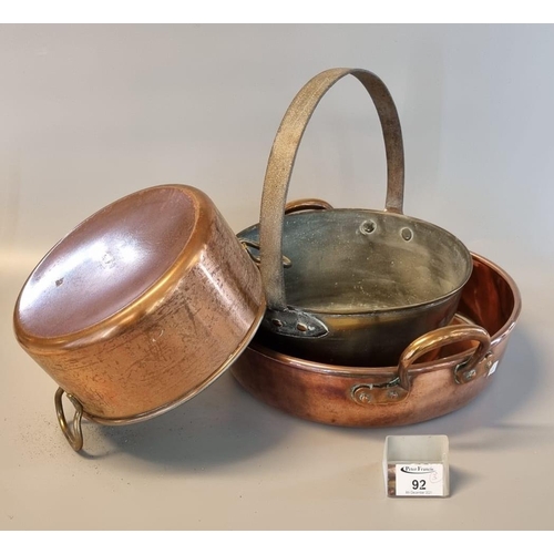 92 - 19th century brass preserving pan with fixed iron handle with a more modern two handled copper pan, ... 