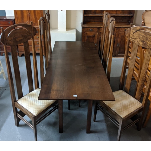 635 - In the style of Charles Rennie Mackintosh a set of six high back oak dining chairs with table of pla... 