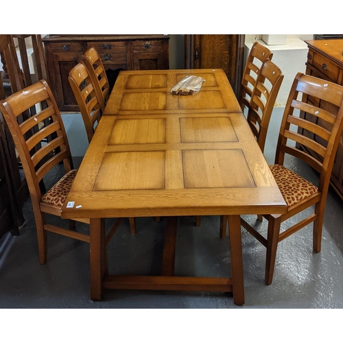 636 - Good quality modern oak dining room suite comprising: panel topped dining table (200 x 88 x 76cm app... 