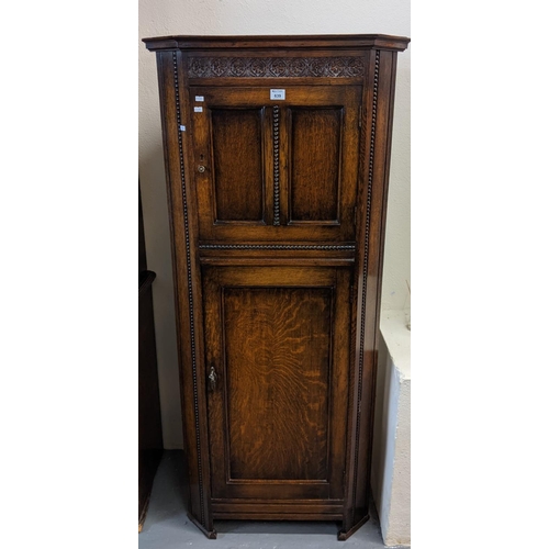 639 - Reproduction mahogany blind panelled hall corner cupboard with upper and lower cupboards. 72cm wide ... 