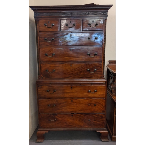 648 - Georgian style mahogany two stage chest on chest, the moulded and Greek key cornice above strap work... 