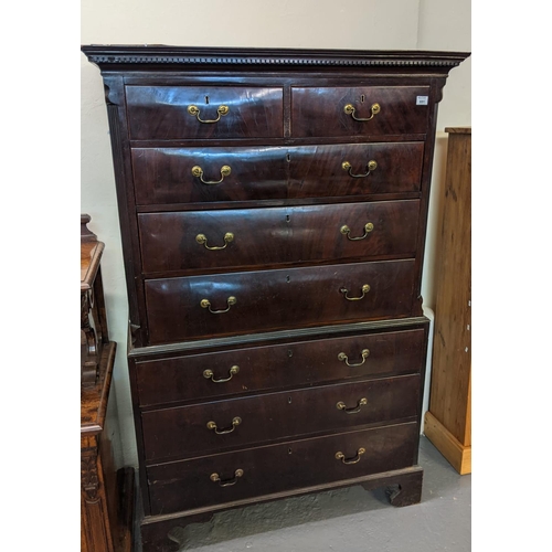 651 - 19th Century mahogany two stage chest on chest, the moulded and dental cornice above an arrangement ... 