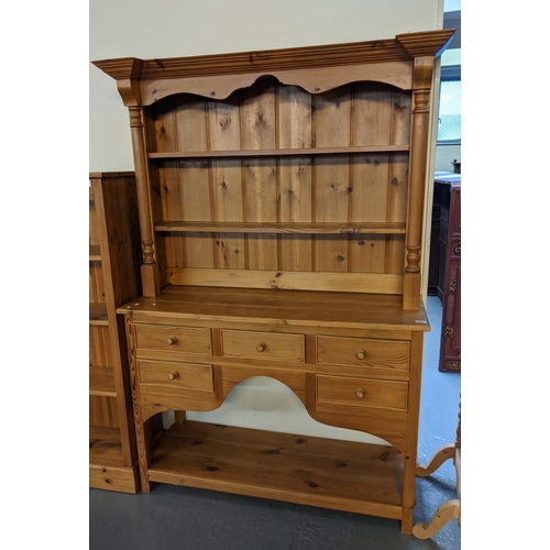 653 - Modern natural pine Welsh pot board dresser with boarded two shelf rack, having half turned pilaster... 