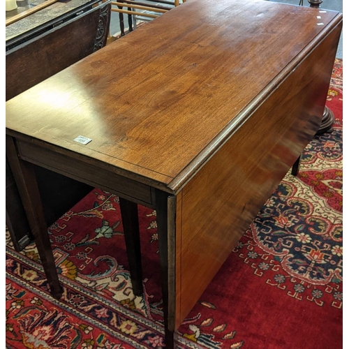 656 - 19th Century mahogany gate action double drop leaf dining table with ebony strung outlines on square... 