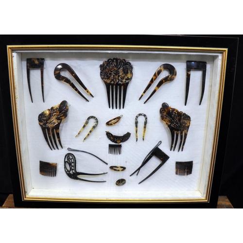 97 - Glazed case containing an assortment of antique tortoiseshell and other hair combs and accessories, ... 