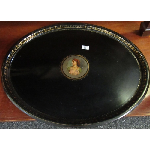 76 - 19th Century Pontypool style black Japanned metal oval tray with gilded decoration, the centre decor... 